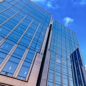 What should you take into consideration before using a curtain wall facade for your building